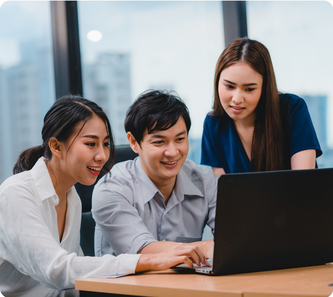 Team working at a laptop